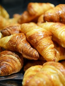 close up shot with many croissants